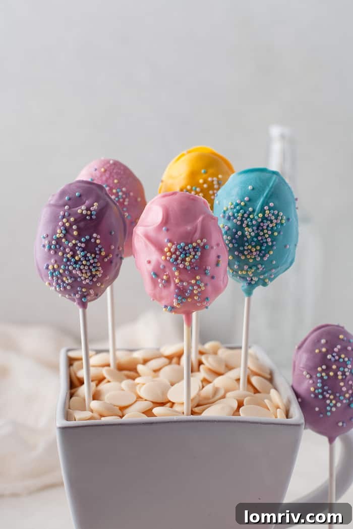 Delicious and vibrant Easter Cake Pops arranged on a platter, ready for holiday celebrations.
