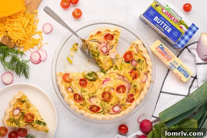 Perfectly baked Farm Vegetable Quiche, golden brown and ready to serve