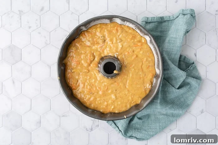 Carrot Bundt Cake batter in pan