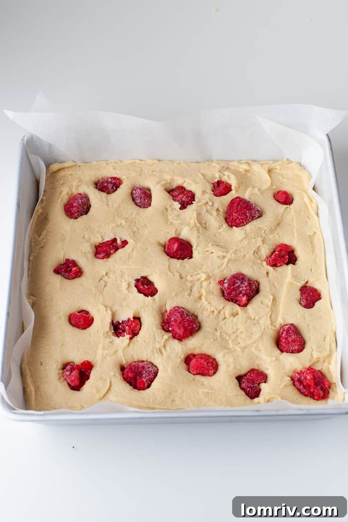 Adding frozen raspberries to blondie batter