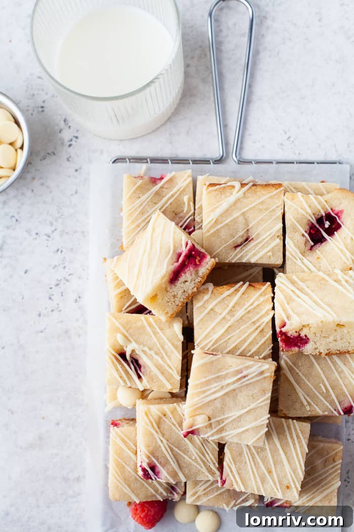 A slice of Raspberry Blondie ready to eat
