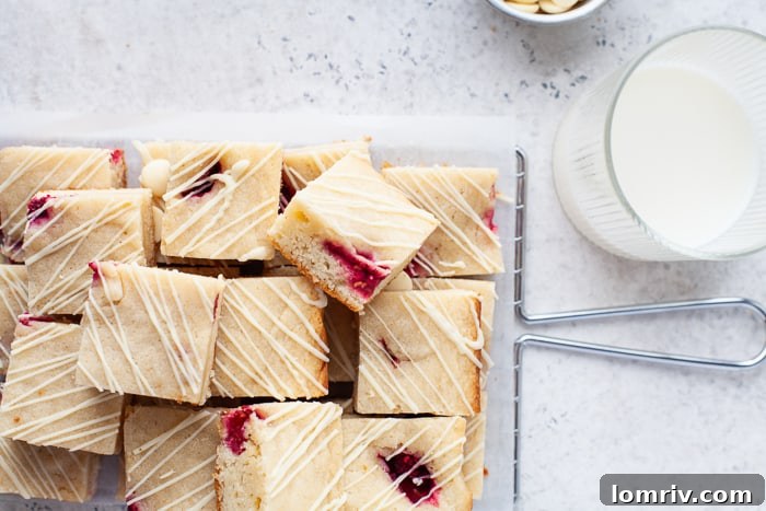 Raspberry Blondies cooling on a rack
