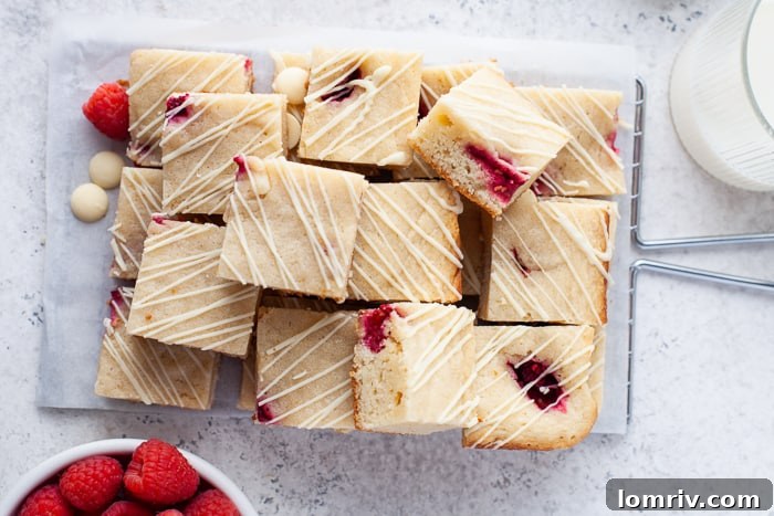 Sliced Raspberry Blondies ready to serve