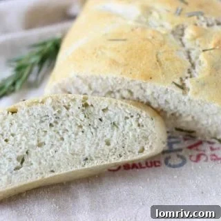 This classic rosemary olive oil bread recipe yields a very soft bread on the inside with a golden crunchy crust. Incredibly easy to make too.