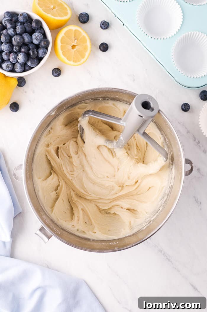Light and fluffy cream cheese frosting in a mixer