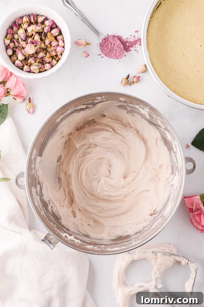 Creamy rose buttercream in a mixing bowl.