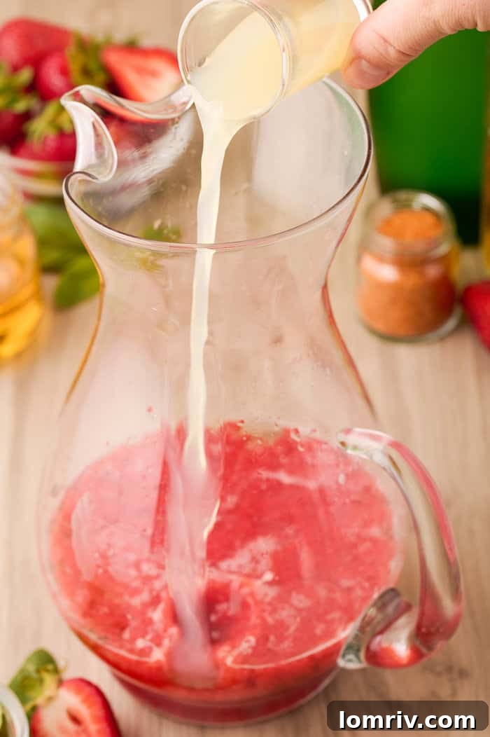 Another step-by-step image showing the mixing process of the Strawberry Paloma base