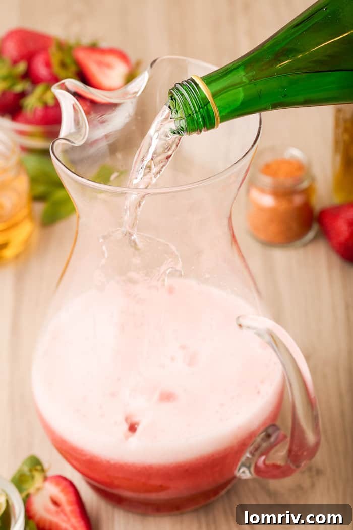 Close-up of the mixed Strawberry Paloma base in a pitcher