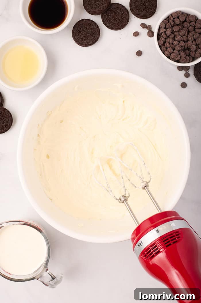 Lemon juice added to the creamy mixture of cream cheese and sugar, enhancing the cheesecake's flavor.