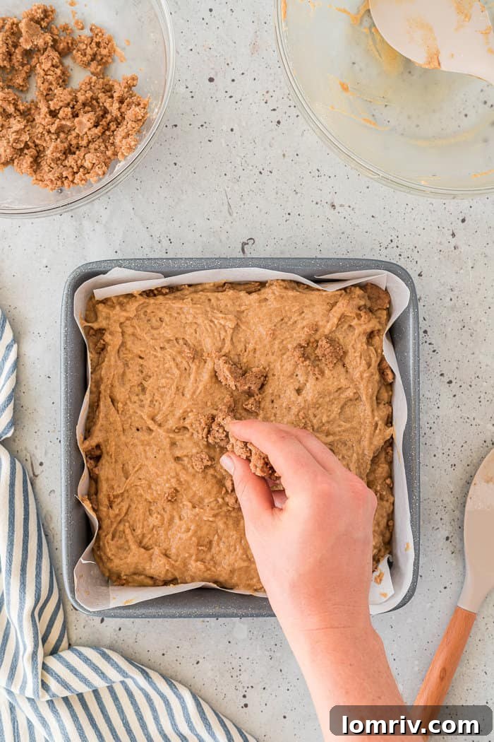 Second layer of chai coffee cake batter added