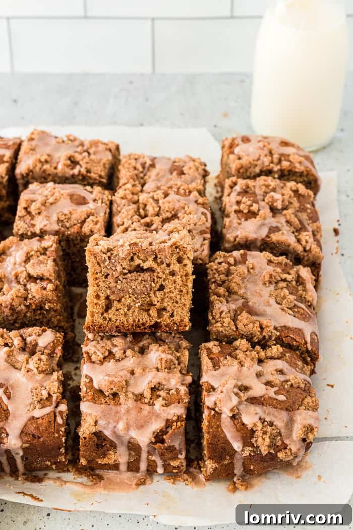 Chai coffee cake cut into squares, ready for glaze