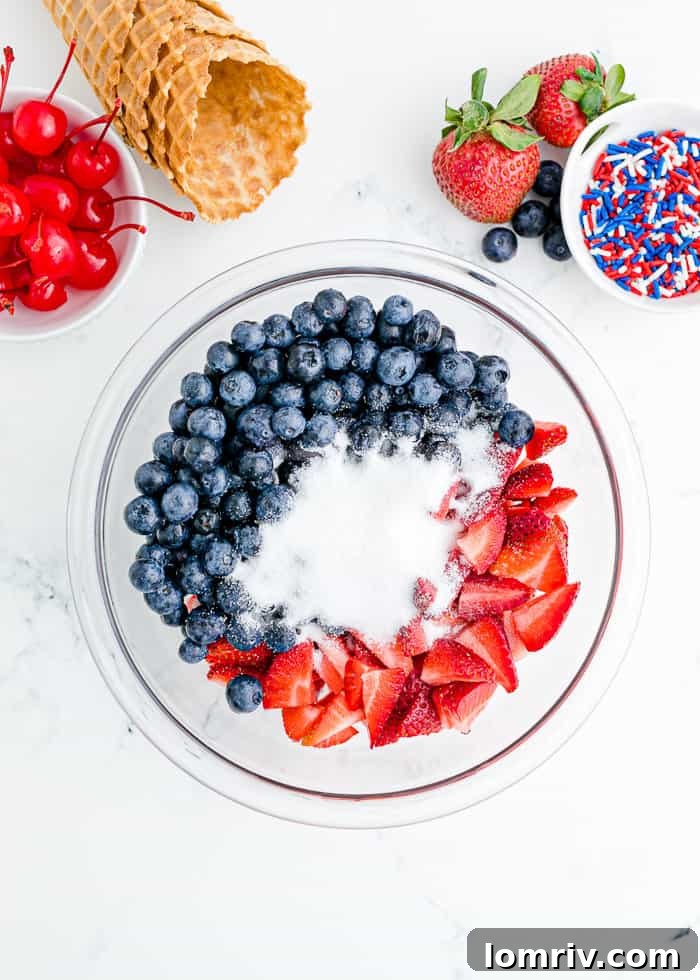 Close-up of prepared berries in a bowl, ready for chilling.