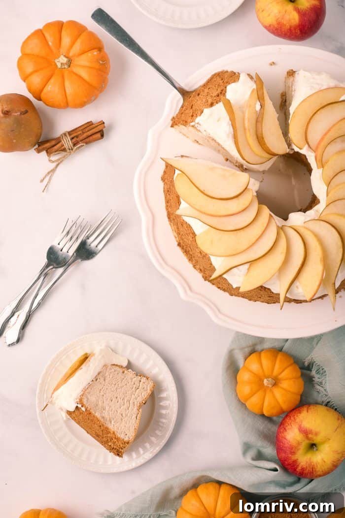 Pumpkin spice angel food cake with a slice removed.