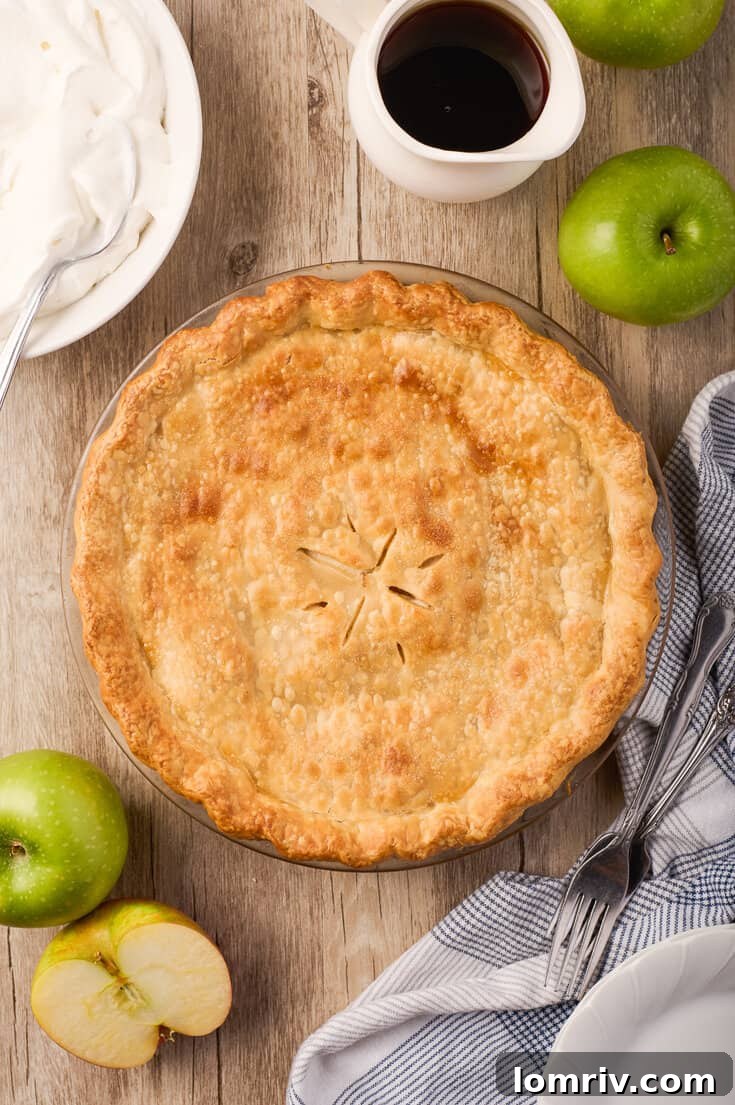 A delectable Maple Cream Apple Pie, showcasing its golden crust and creamy filling.