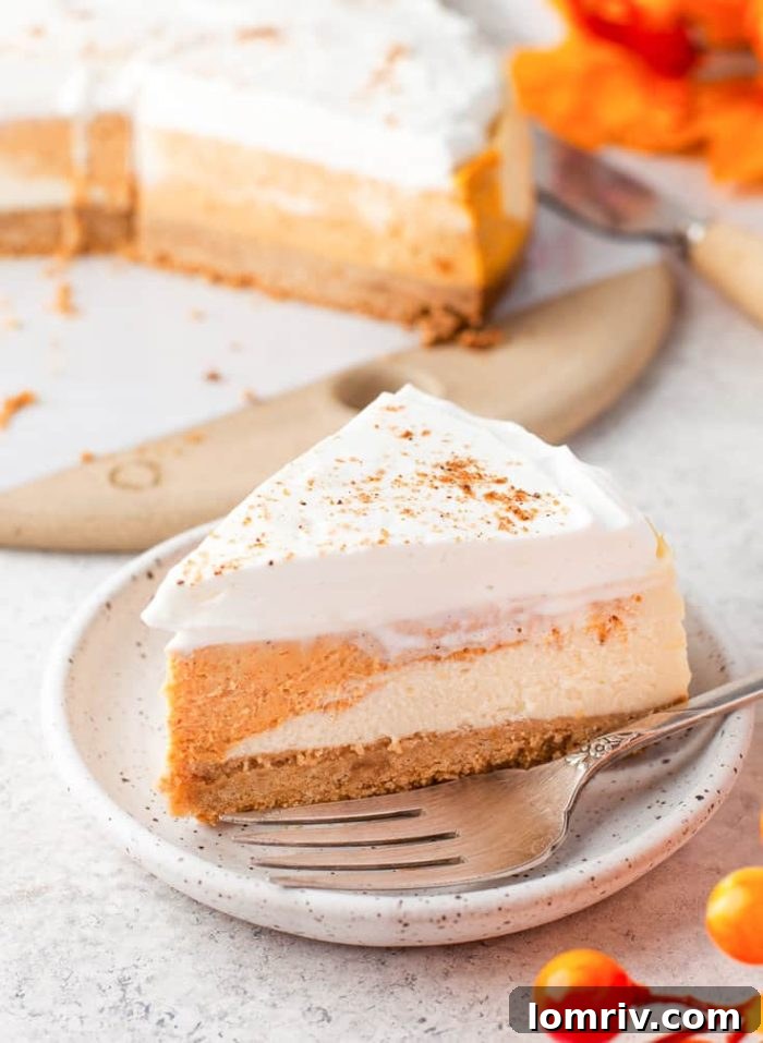A slice of instant pot pumpkin cheesecake on a plate.