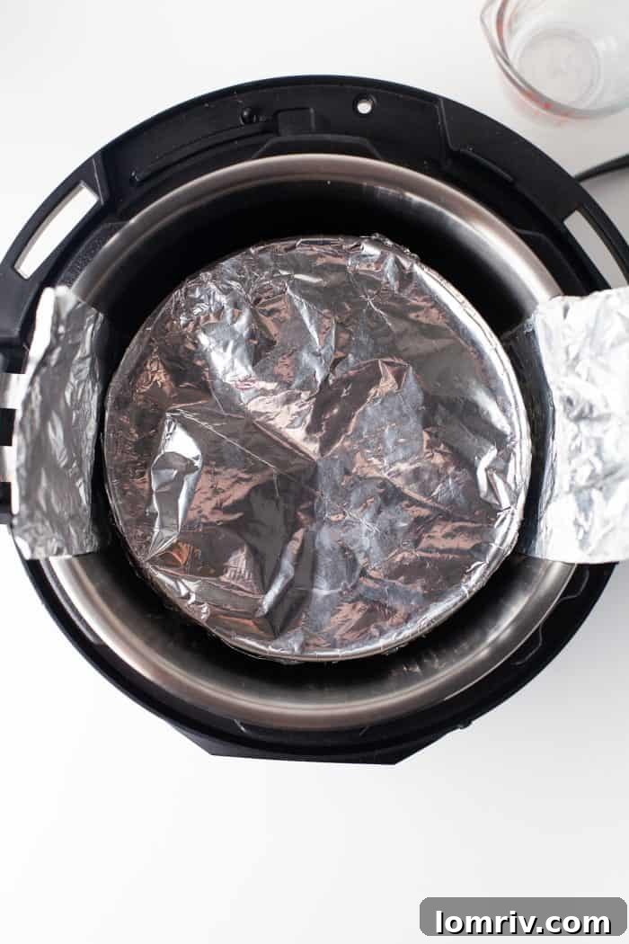 Instant pot prepared for cheesecake.