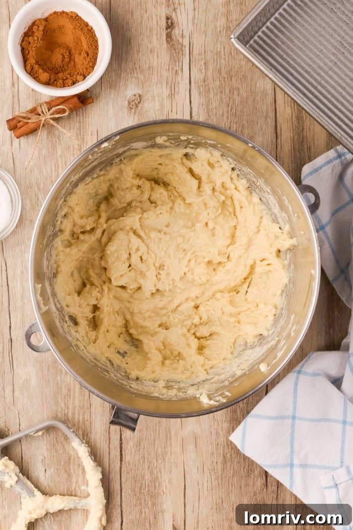 The fully mixed cake batter, showing its characteristic thick and slightly lumpy consistency.
