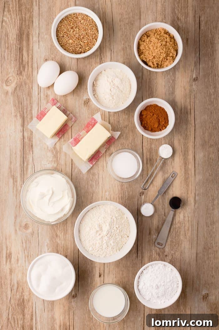 All the necessary ingredients for making sour cream coffee cake laid out on a kitchen counter.