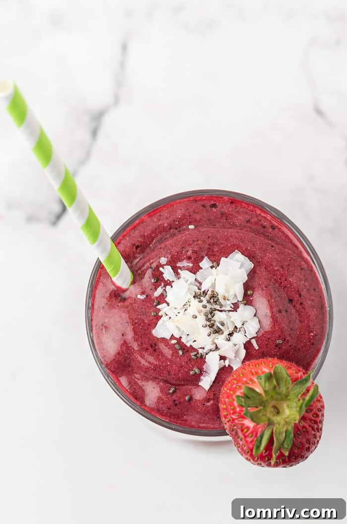 Very Berry Coconut Chia Smoothie with a straw