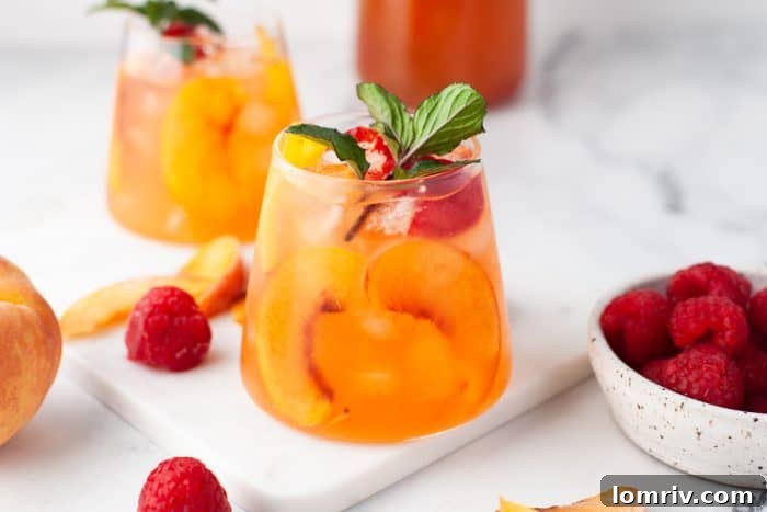 Glasses of peach sangria.