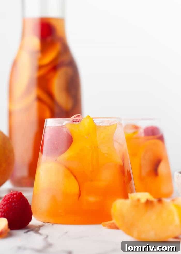 A glass of peach rose sangria.