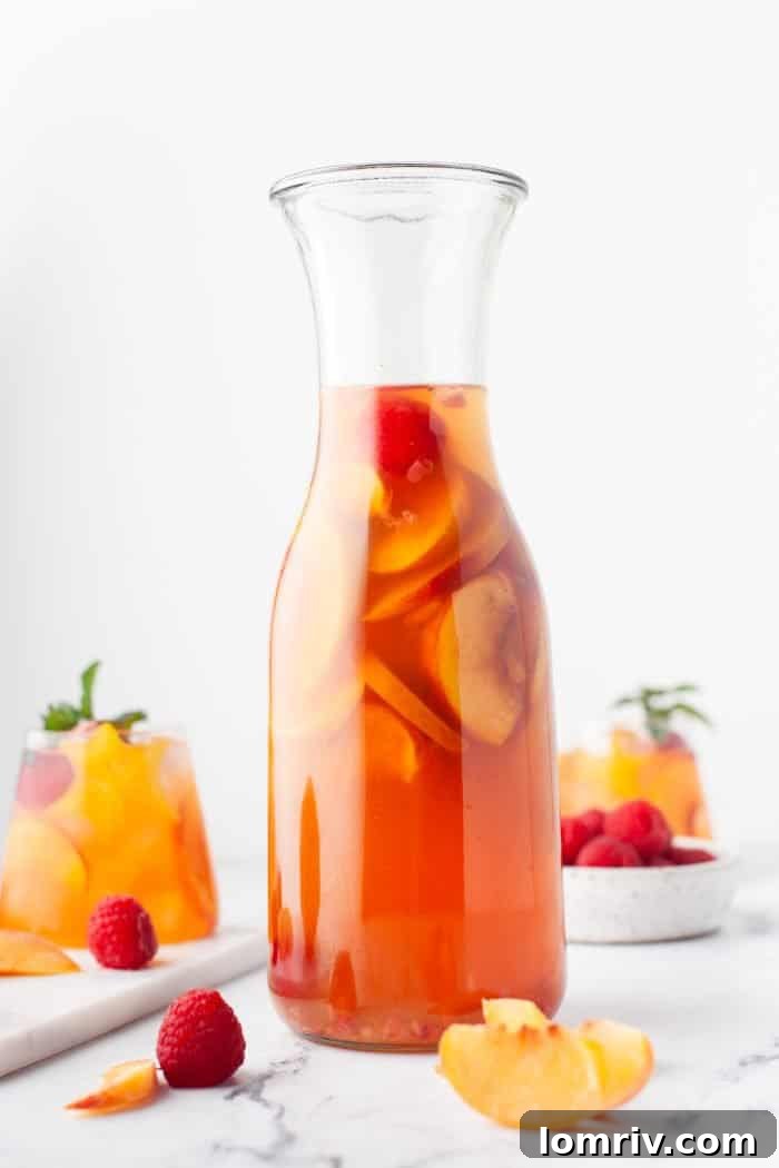 A pitcher of peach rose sangria.
