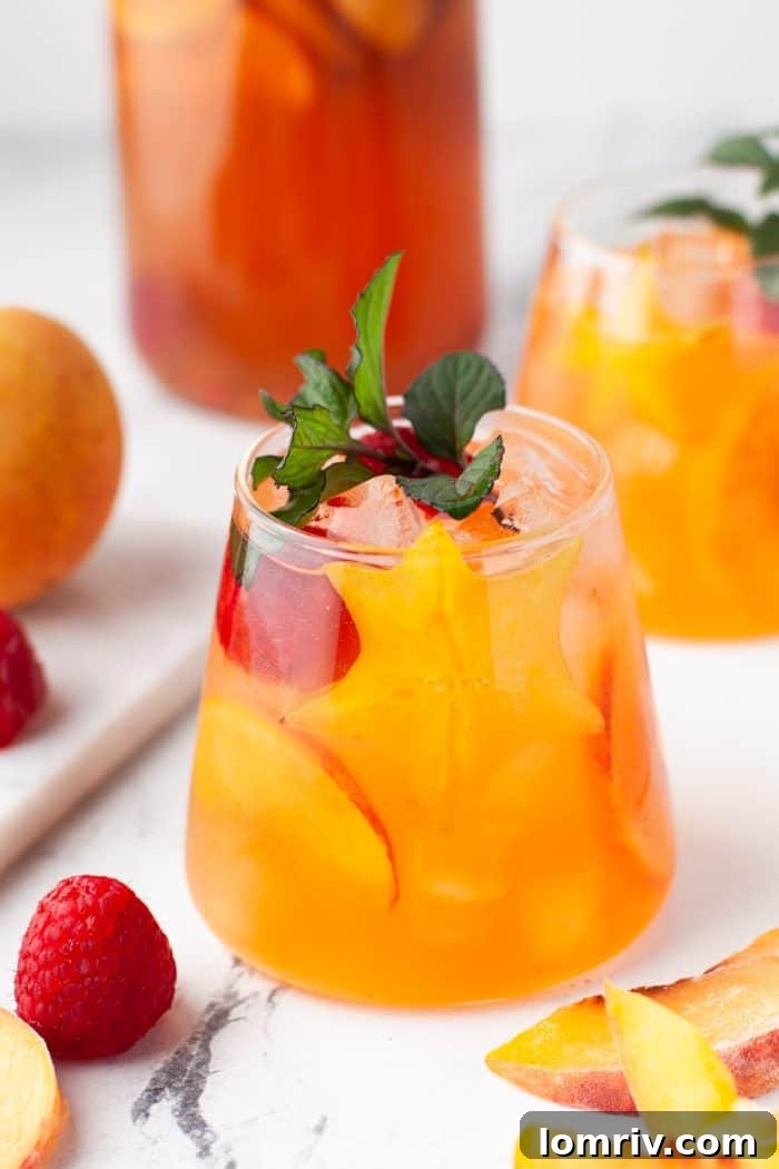 A glass of peach rose sangria.