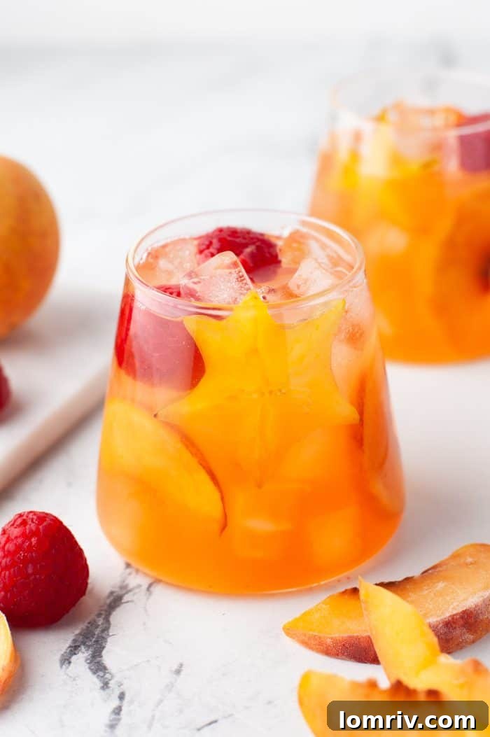 A glass of peach rose sangria.
