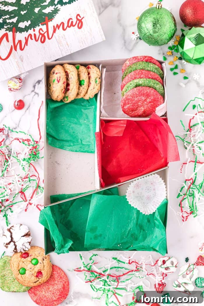 Further arrangement of cookies and candies in a holiday box.
