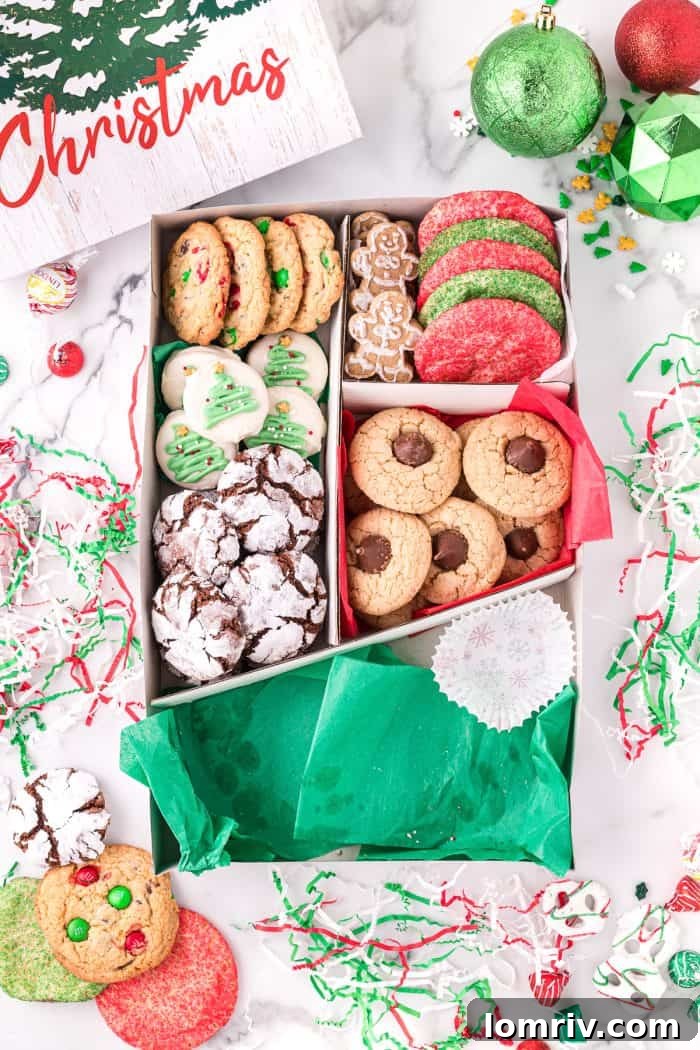 Finishing touches being added to the holiday cookie box.