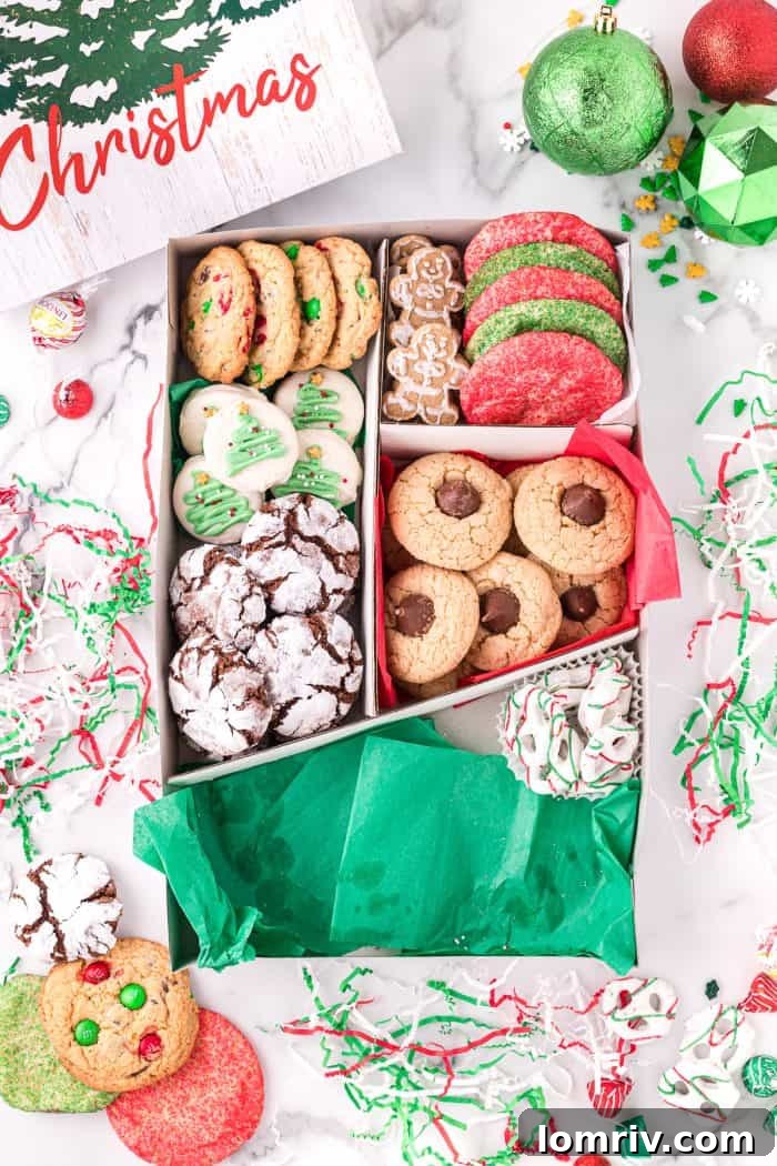 A nearly complete holiday cookie box, showcasing varied treats.