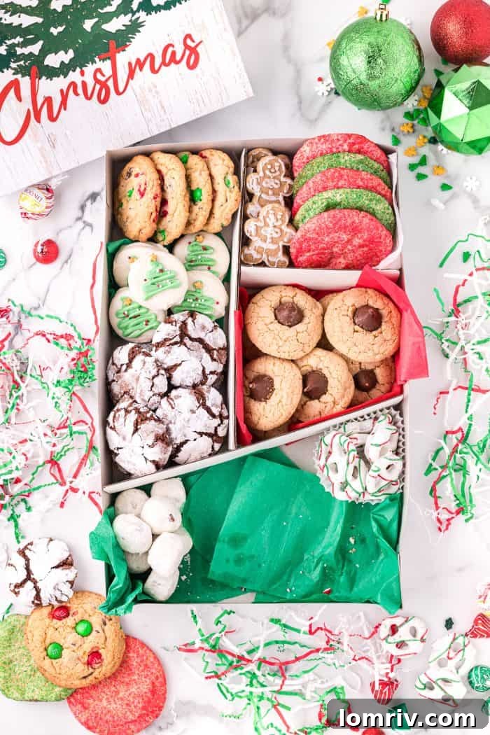 A beautifully arranged holiday cookie box ready for gifting.