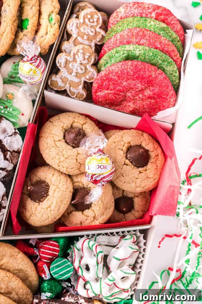 A holiday cookie box on a table, ready for its next step in the assembly process.