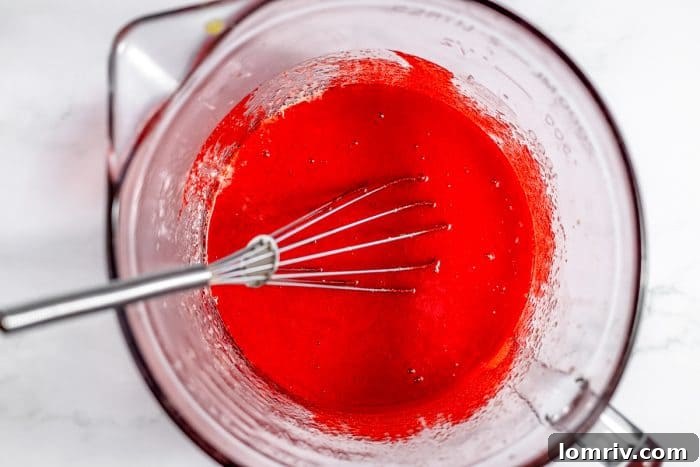 Finished red velvet brownie batter in a mixing bowl, ready for baking.
