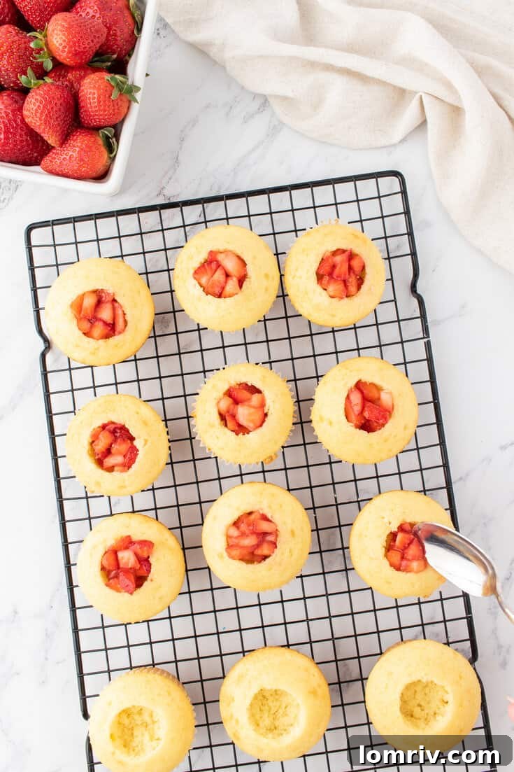 Cupcakes filled with strawberry filling.