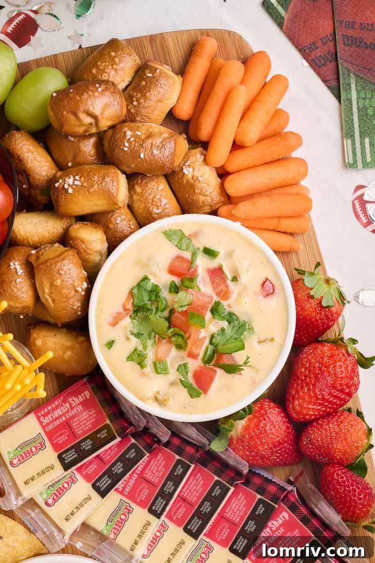 A second shot of the Game Day charcuterie board, showcasing its vibrant arrangement of snacks.
