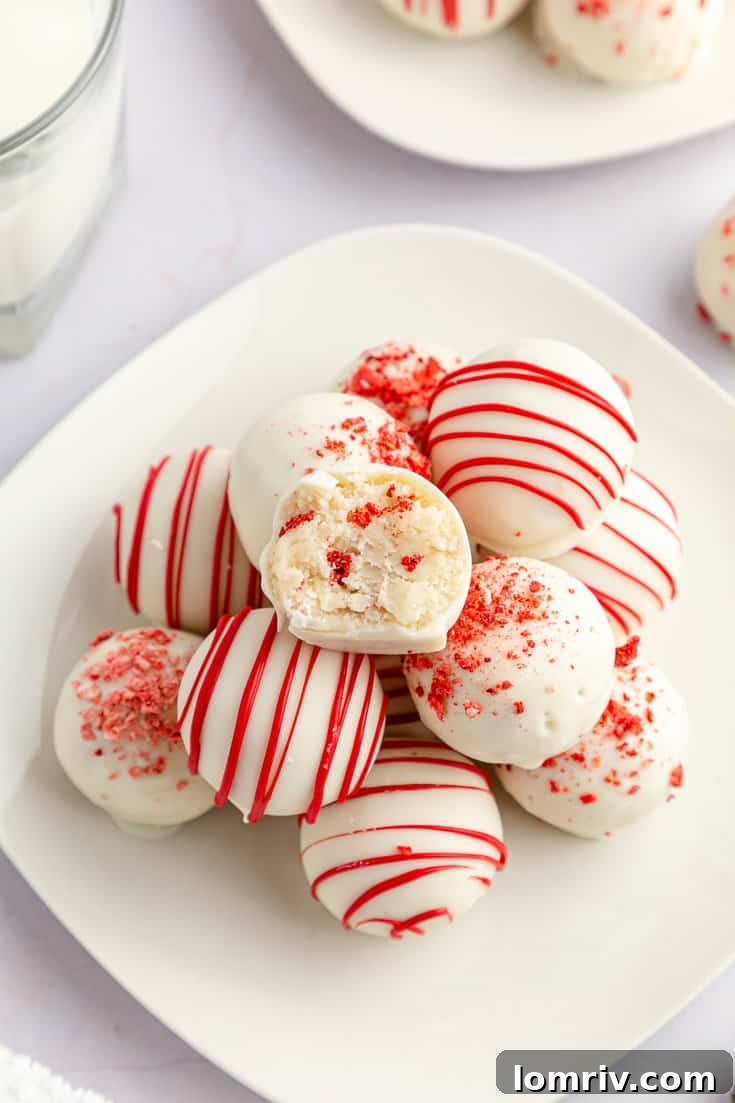 A plate of delightful strawberry cake balls, ready to be enjoyed.
