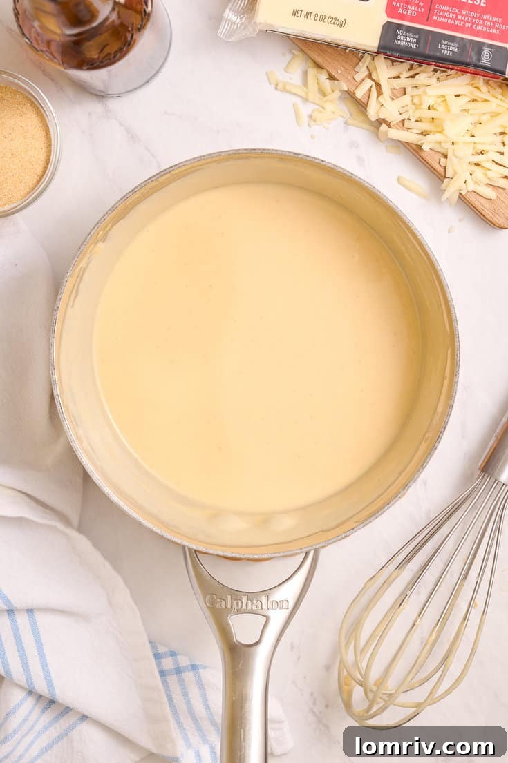 Making beer cheddar cheese dip.