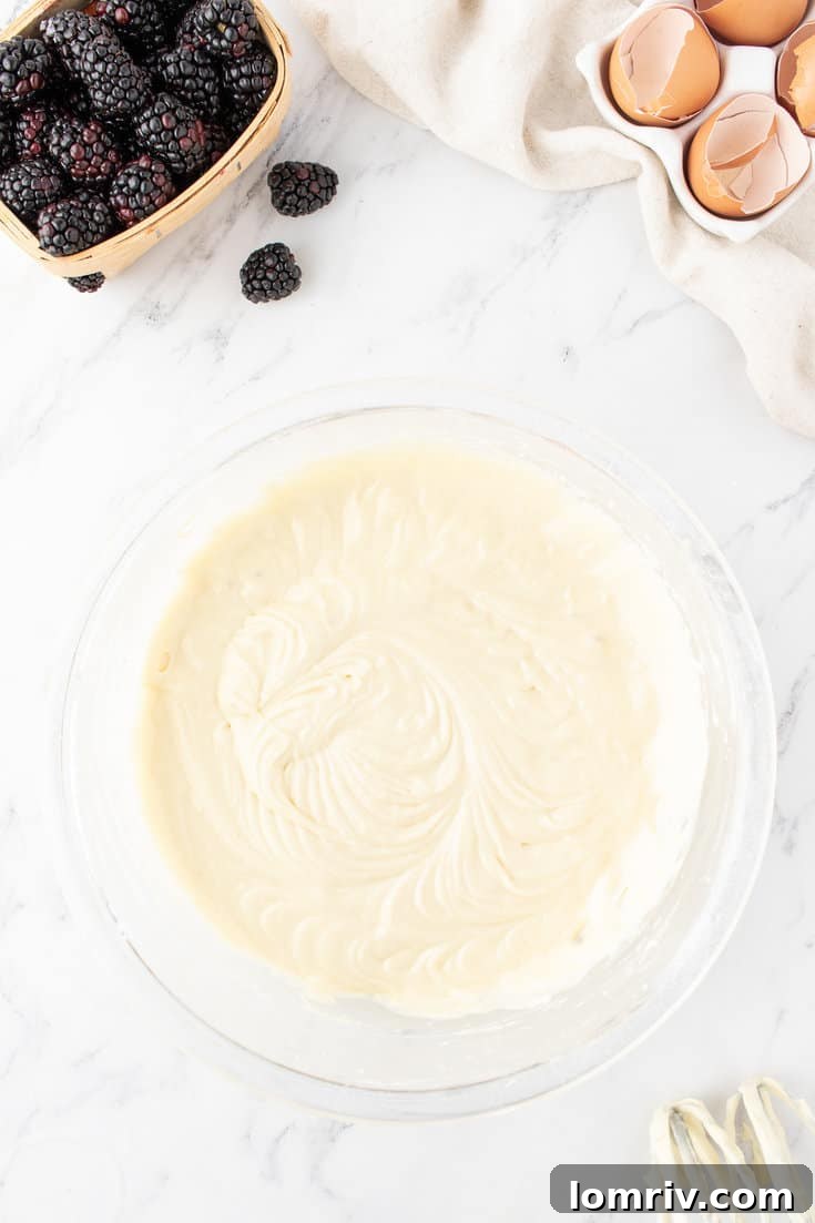 Another angle of the perfectly mixed cake batter, showing its smooth consistency.