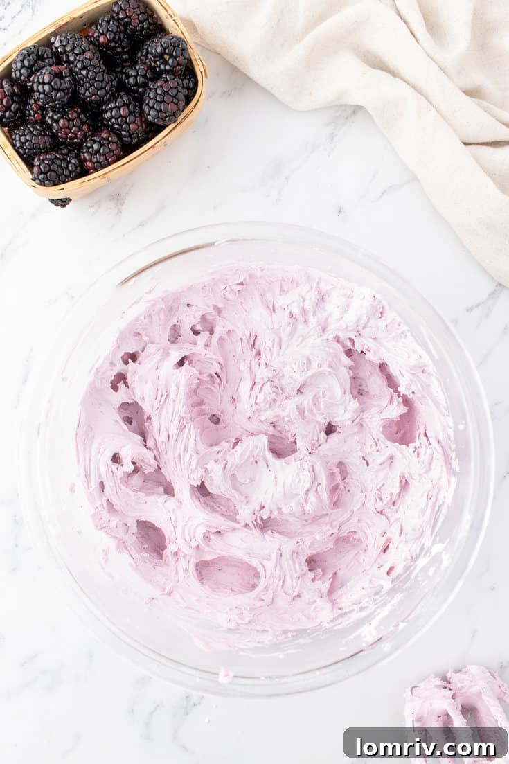 The finished blackberry buttercream, showcasing its smooth texture and rich color.