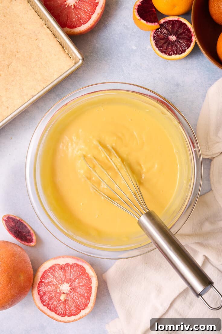 Whisking the custard filling.
