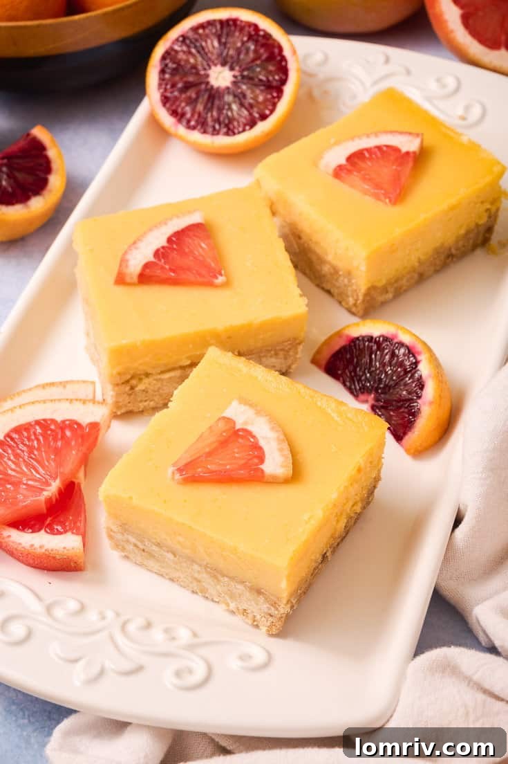 Grapefruit bars on a platter.