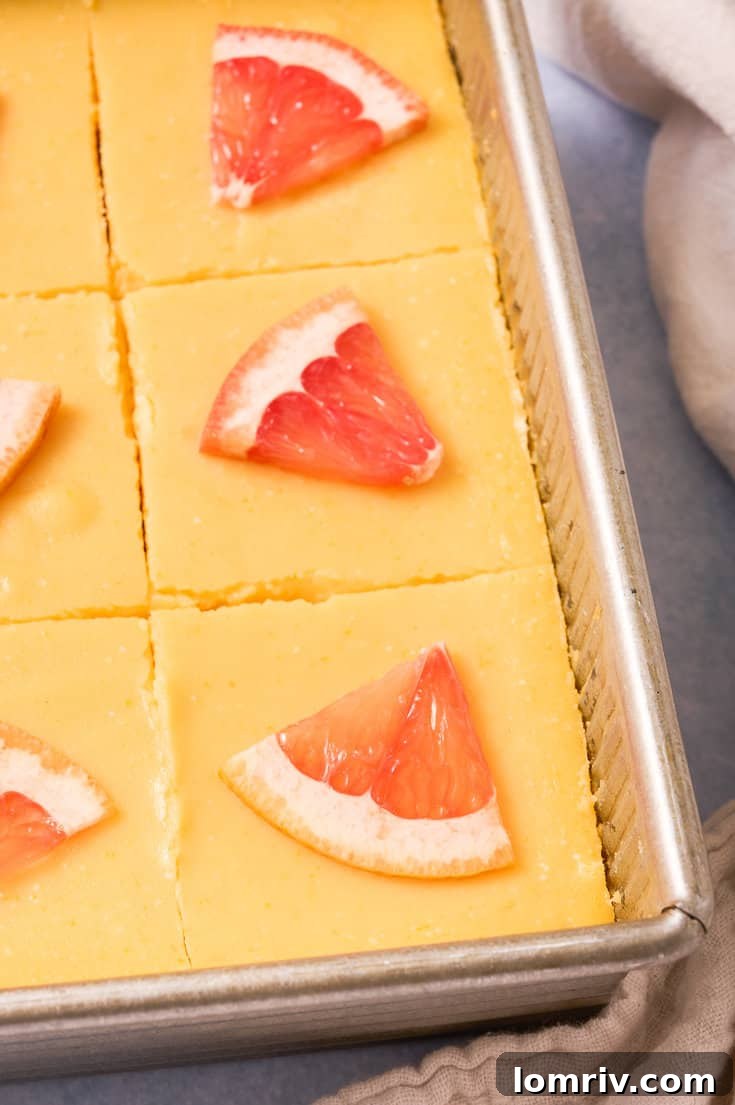 Grapefruit bars in a baking pan.