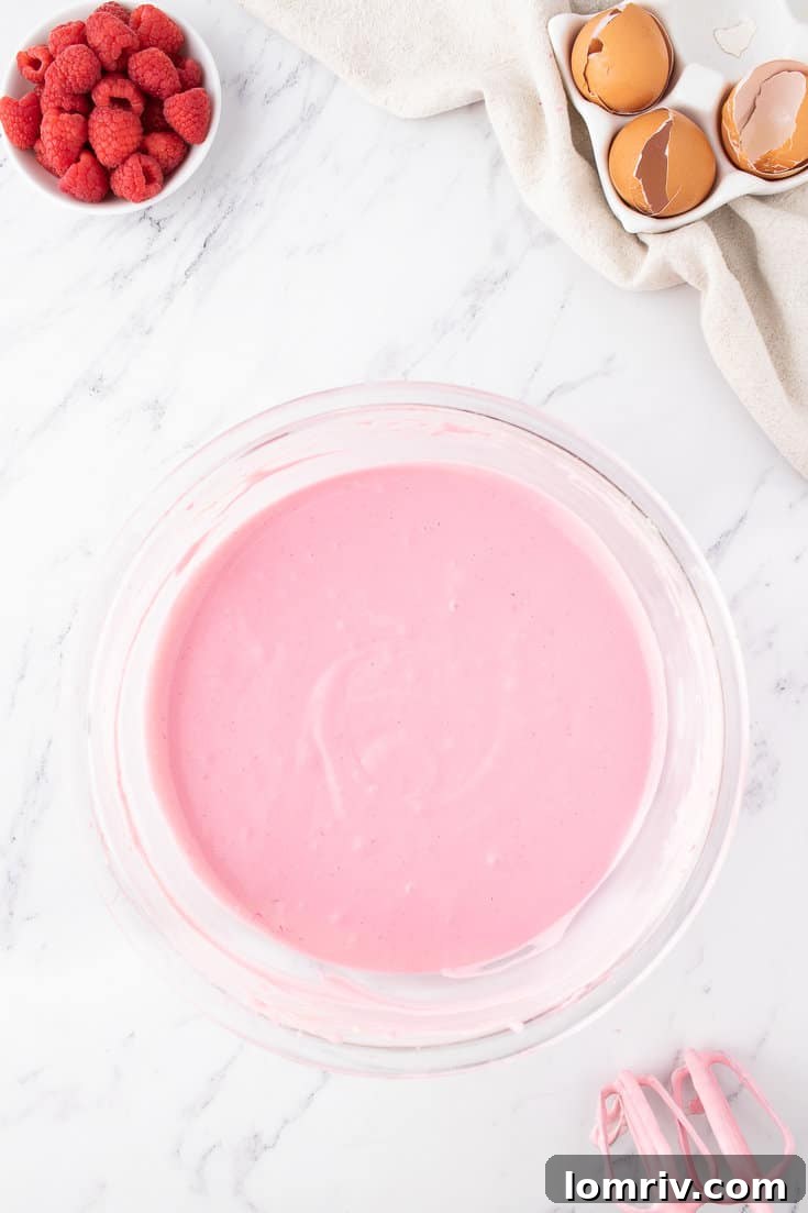 The fully mixed cheesecake batter, ready for baking