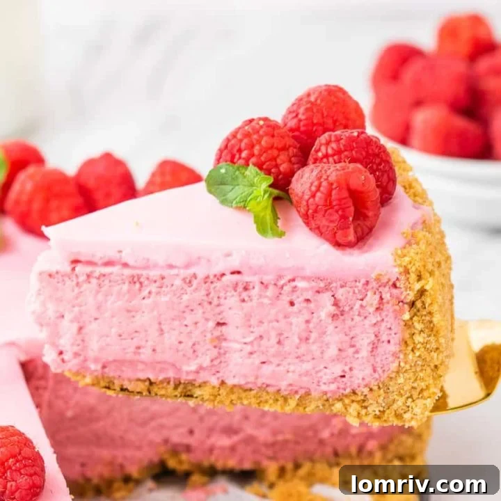Raspberry Cheesecake with white chocolate ganache and fresh berries