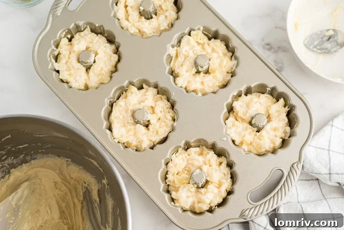 Step 4: Filling mini bundt pans for Mojito Cakes