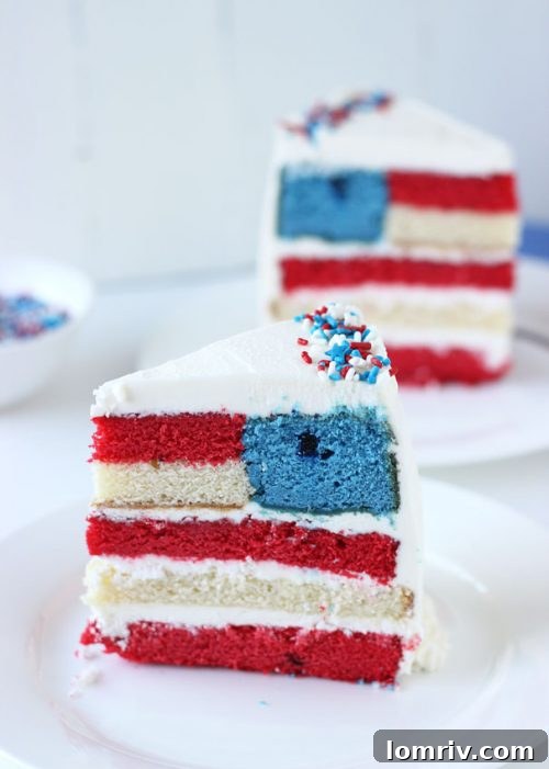 Whole red, white, and blue flag cake with berries on top