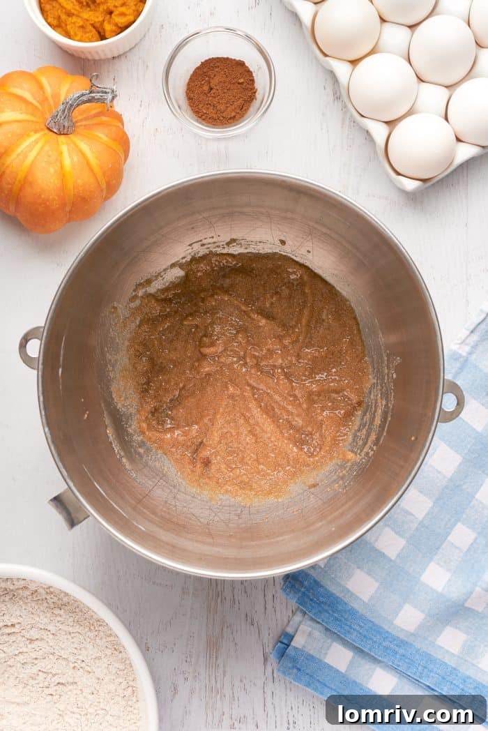 A mixing bowl with wet ingredients.