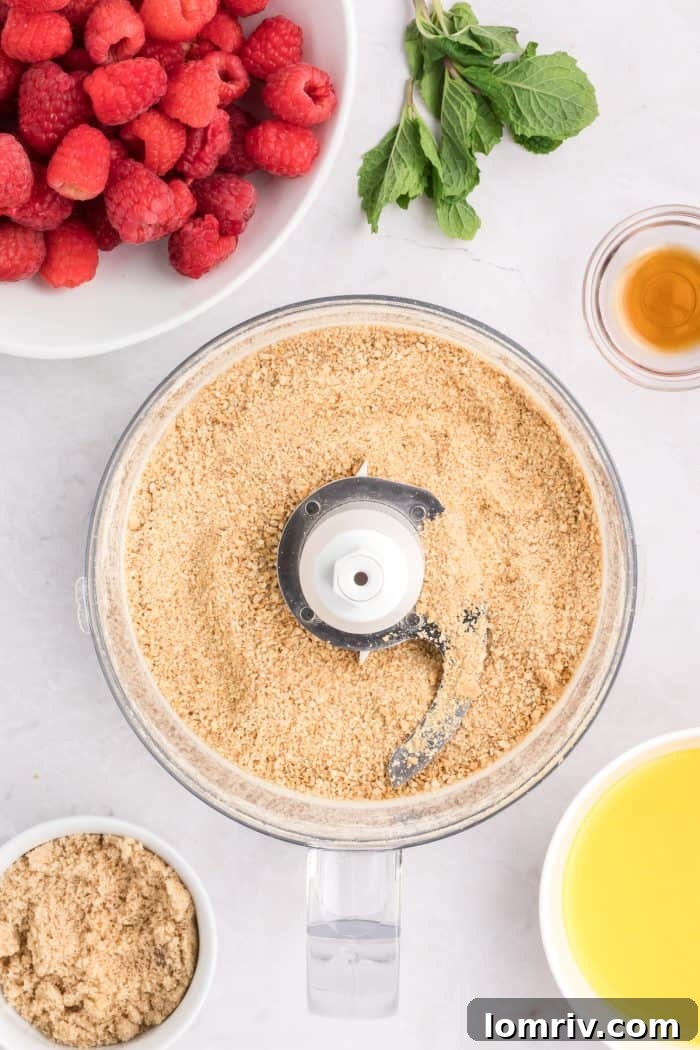 Graham crackers finely ground to crumbs in a food processor.