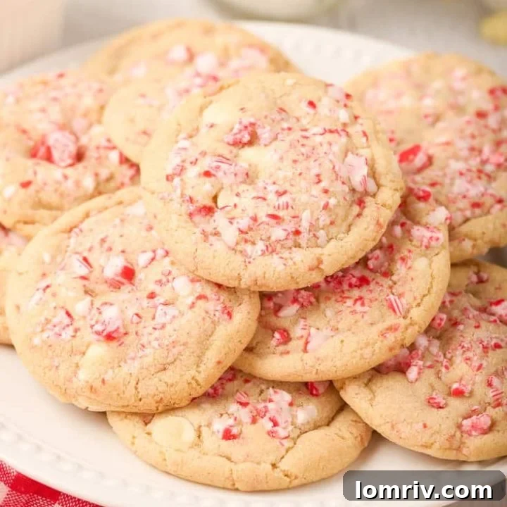 Soft white chocolate cookies generously studded with white chocolate chips and crushed candy canes.